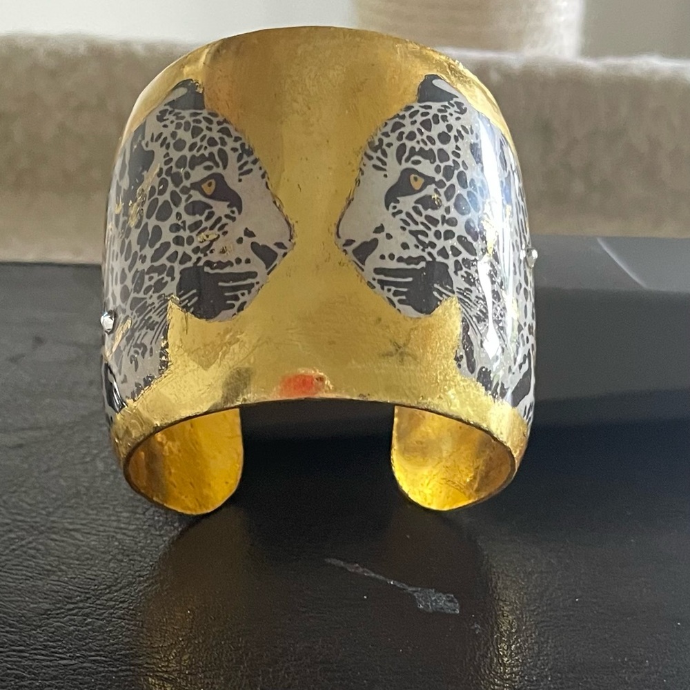 Beautiful hand made Evocateur wide cuff bracelet.